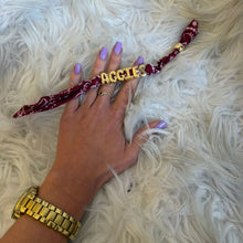 Load image into Gallery viewer, Custom Bandana Slider Bracelet with Gold Letters • College Game Day Spirit Jewelry